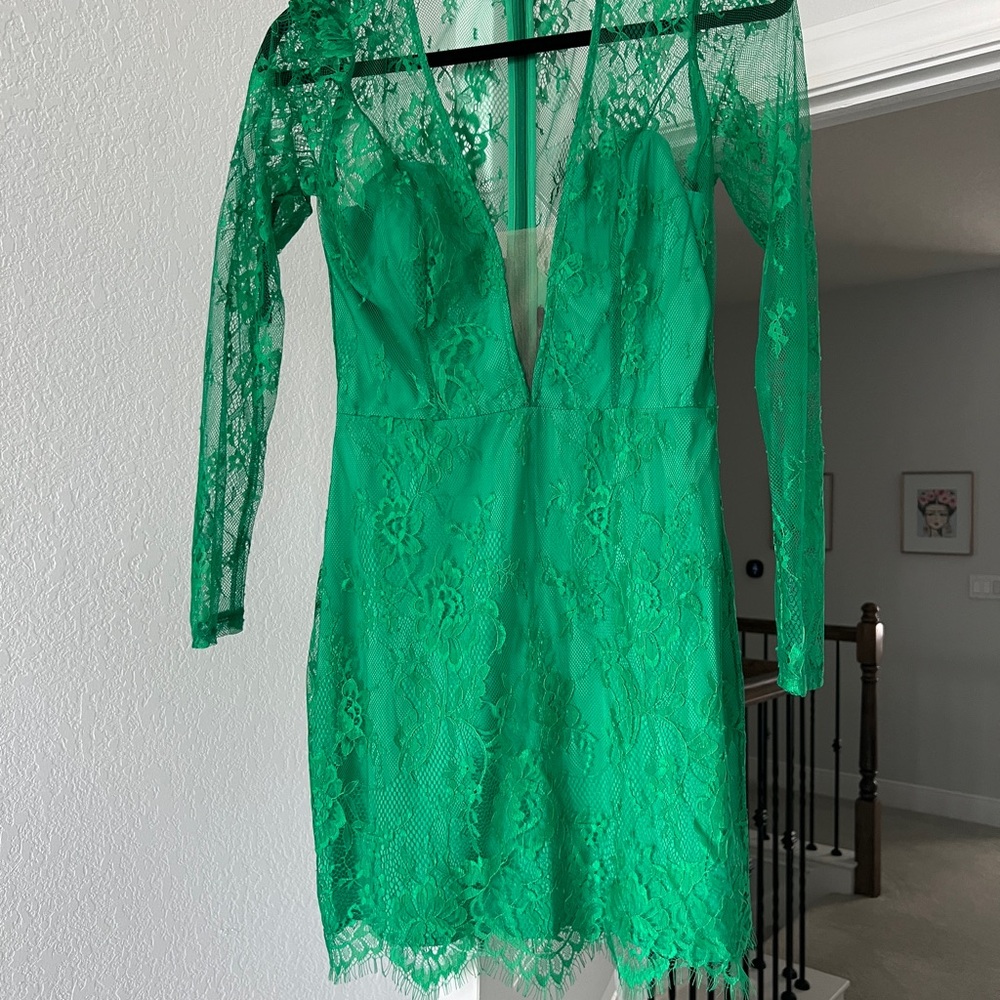 Never worn green lace nbd dress. Perfect for this holiday season!